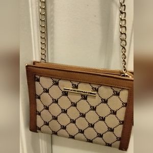 Steve Madden Women's Brown purse with SM initials pattern on the outside